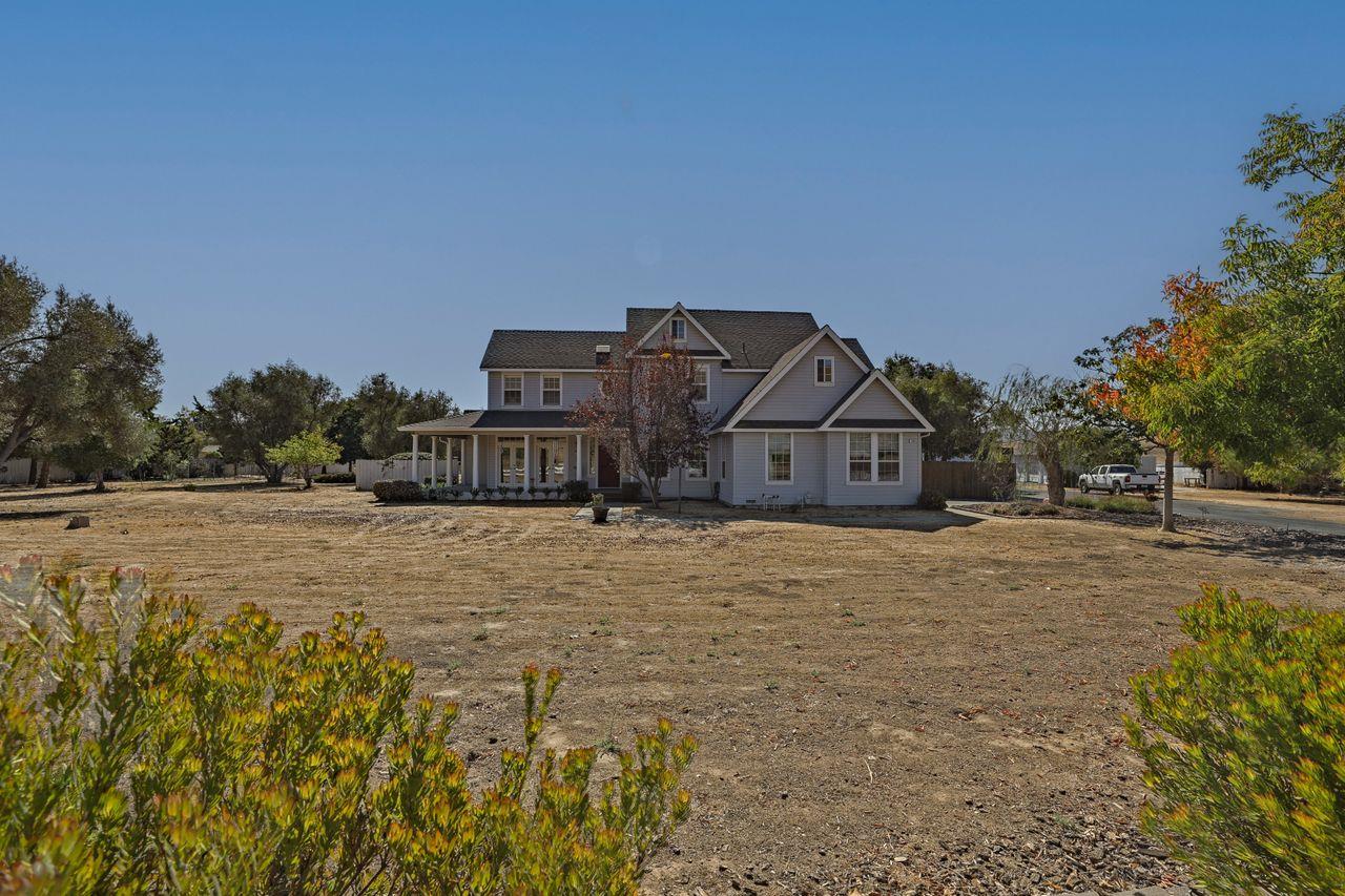 5560 Diablo Hills Road Tres Pinos, CA 95075 - Photo 3 of 46 a view of a house with a yard