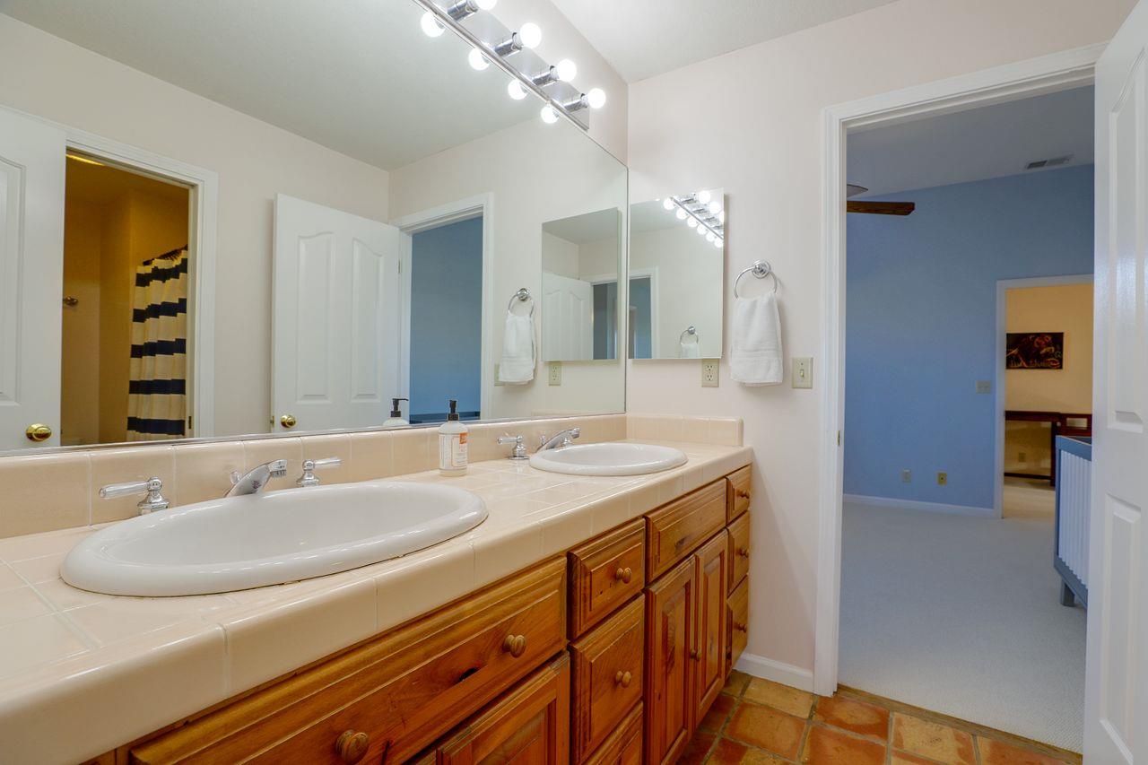 5560 Diablo Hills Road Tres Pinos, CA 95075 - Photo 33 of 46 a bathroom with a sink double vanity and a mirror