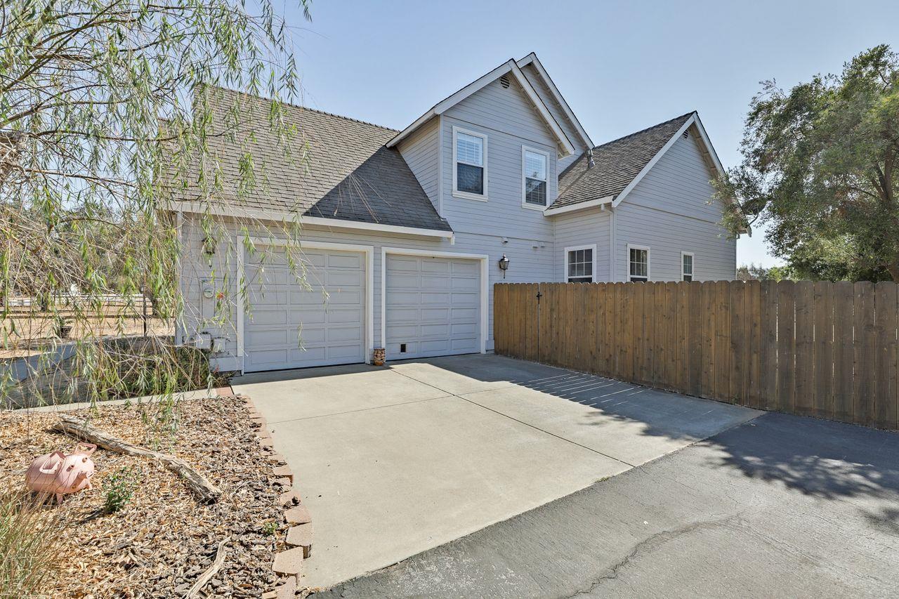 5560 Diablo Hills Road Tres Pinos, CA 95075 - Photo 40 of 46 a front view of a house with a yard and garage