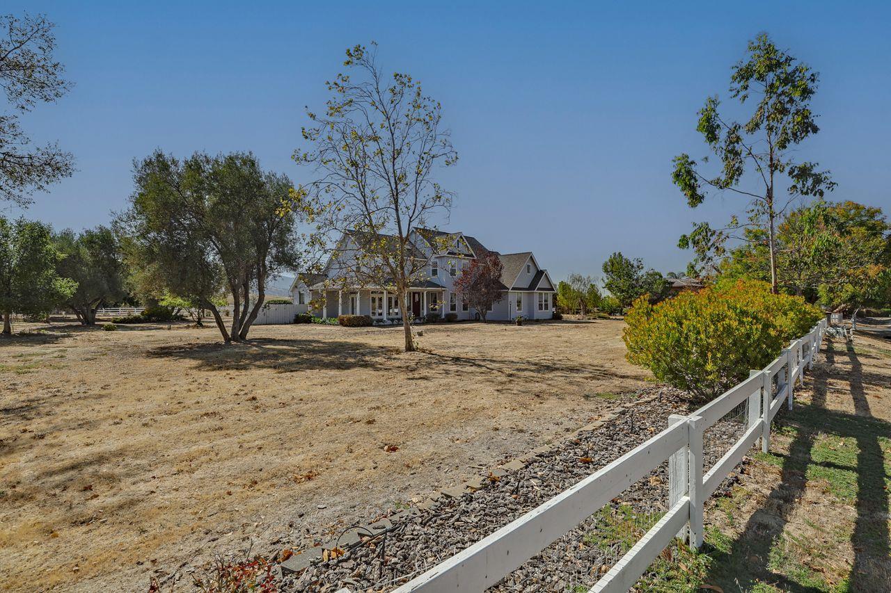 5560 Diablo Hills Road Tres Pinos, CA 95075 - Photo 4 of 46 a view of a yard with wooden fence