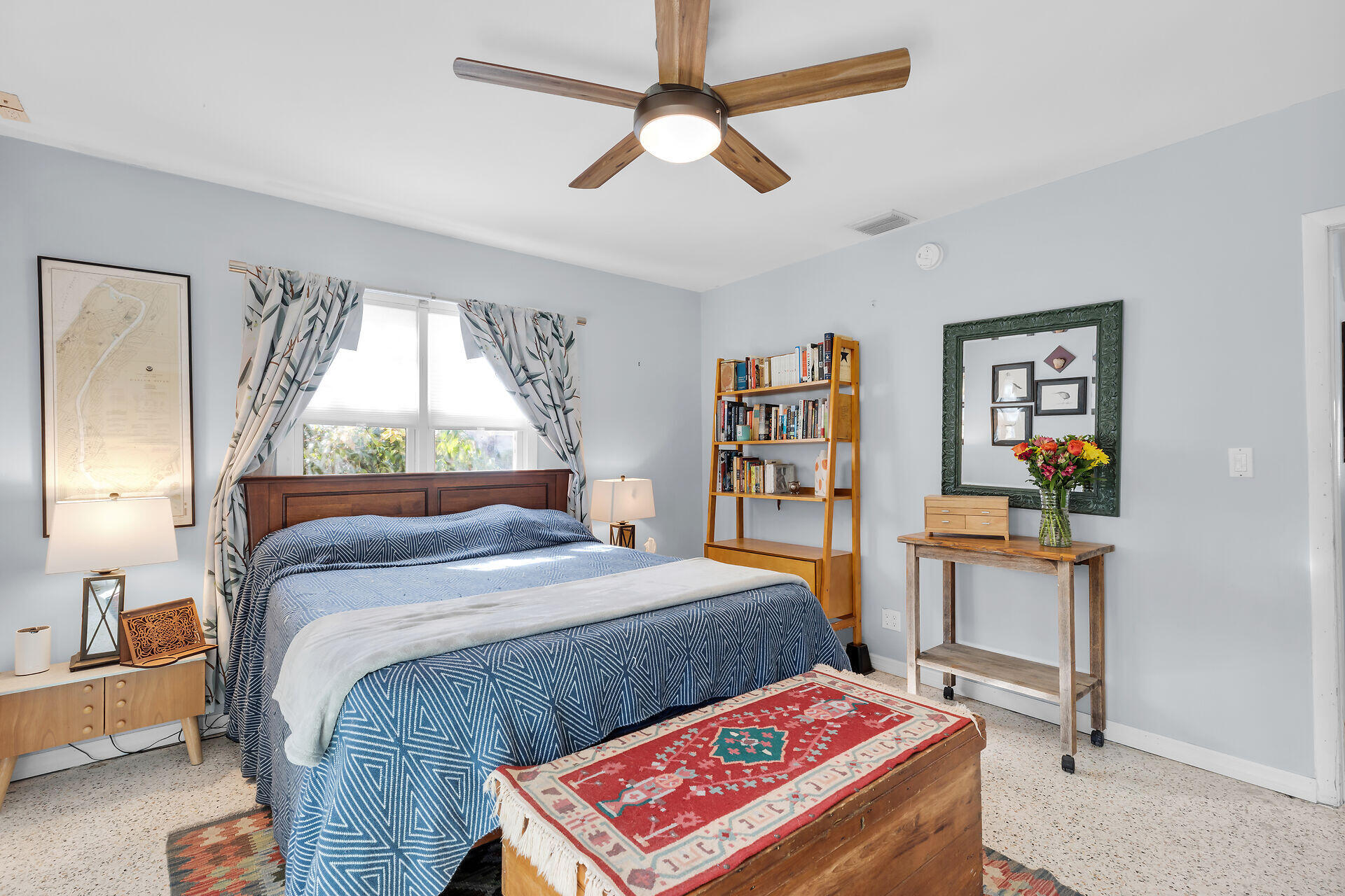 1417 8th Street Key West, FL 33040 - Photo 18 of 44 a bedroom with a bed and a book shelf