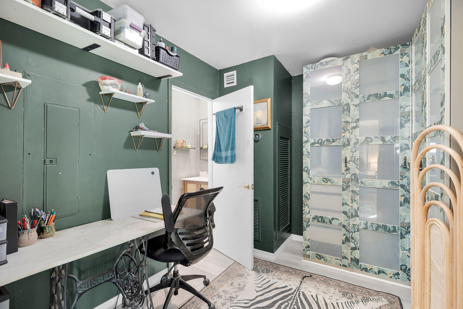 1417 8th Street Key West, FL 33040 - Photo 21 of 44 a workspace with furniture and a chandelier