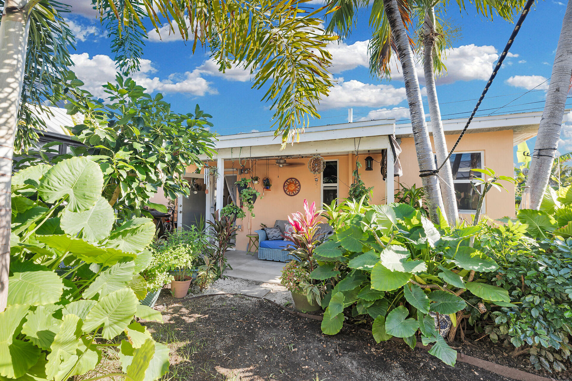 1417 8th Street Key West, FL 33040 - Photo 30 of 44 a front view of a house with a plant