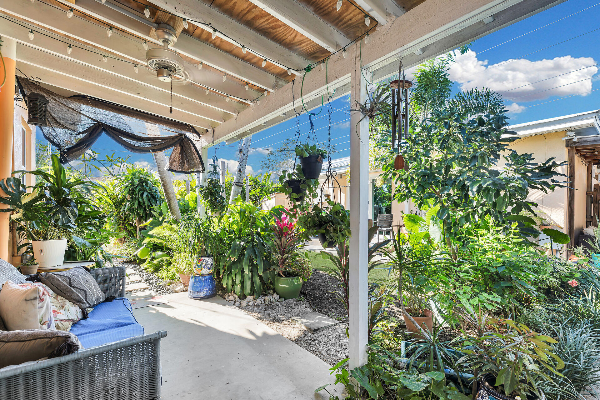 1417 8th Street Key West, FL 33040 - Photo 32 of 44 a view of a porch with furniture and a potted plant