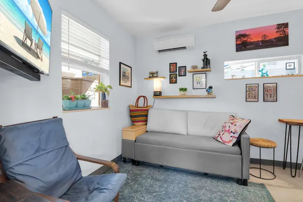 a living room with furniture and a couch