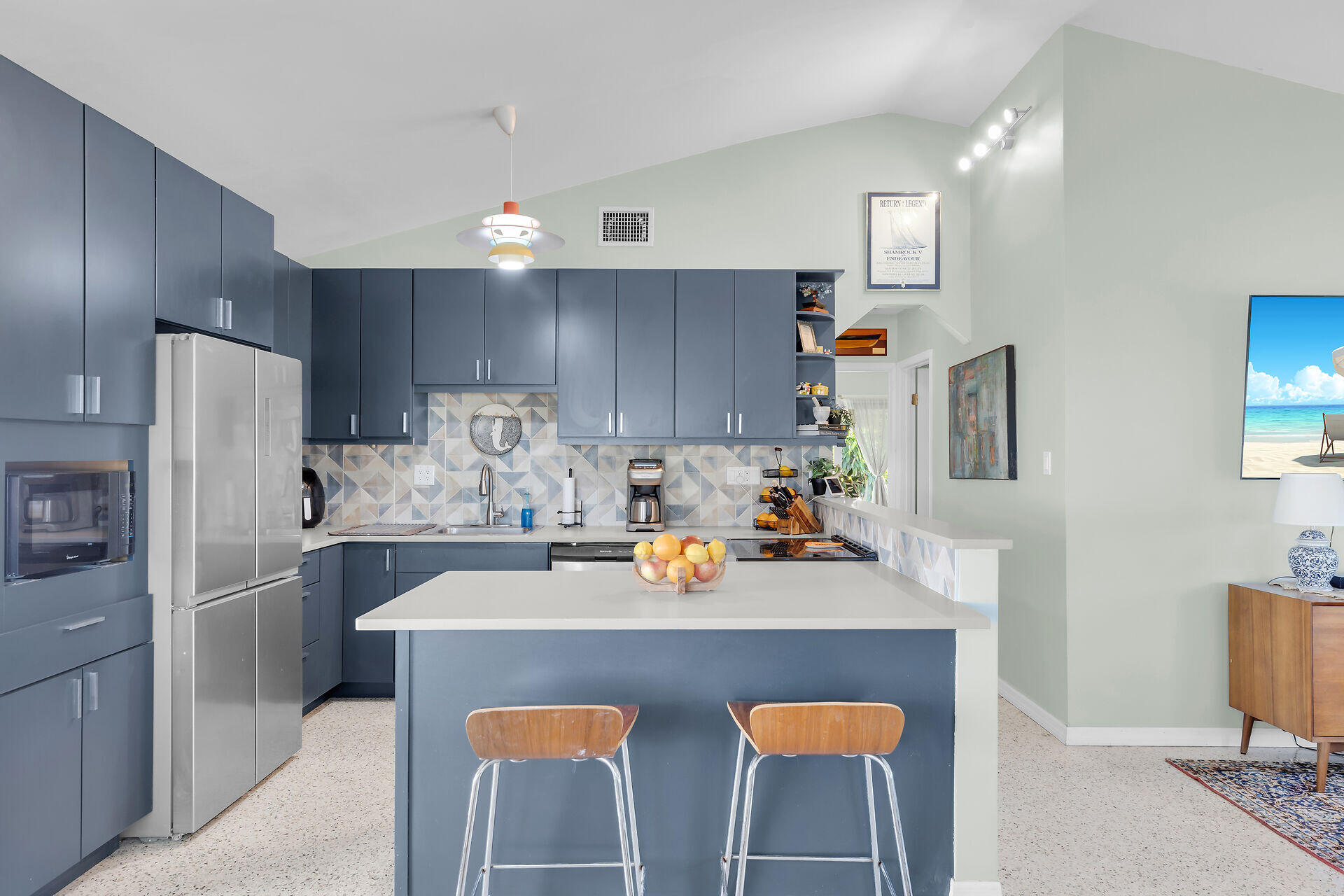 1417 8th Street Key West, FL 33040 - Photo 10 of 44 a kitchen with stainless steel appliances granite countertop a sink cabinets and refrigerator