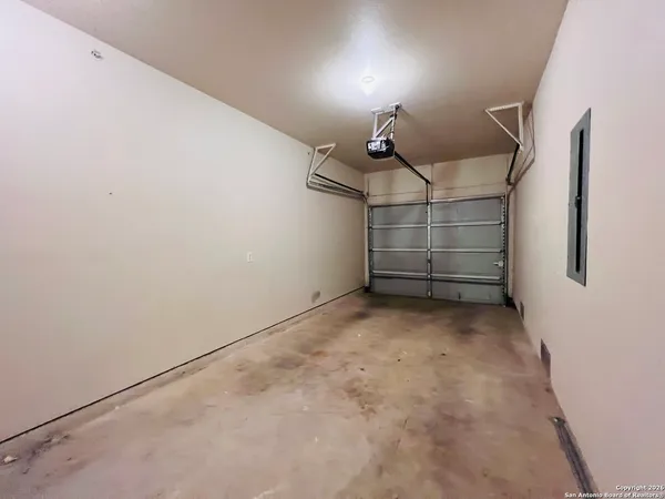 a view of storage and utility room with stairs