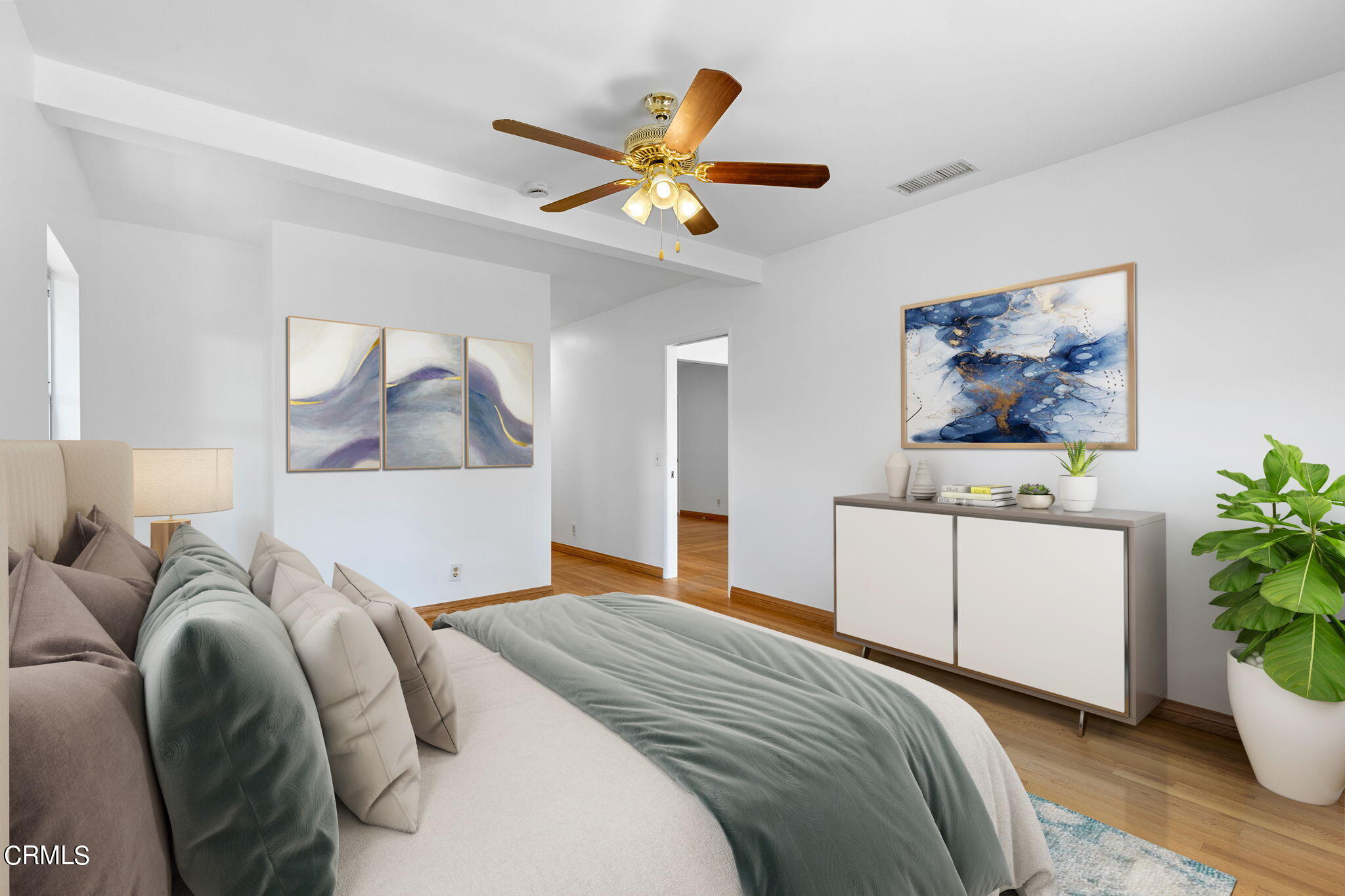 50 Marathon Road Altadena, CA 91001 - Photo 16 of 33 a bedroom with a large bed and a chandelier