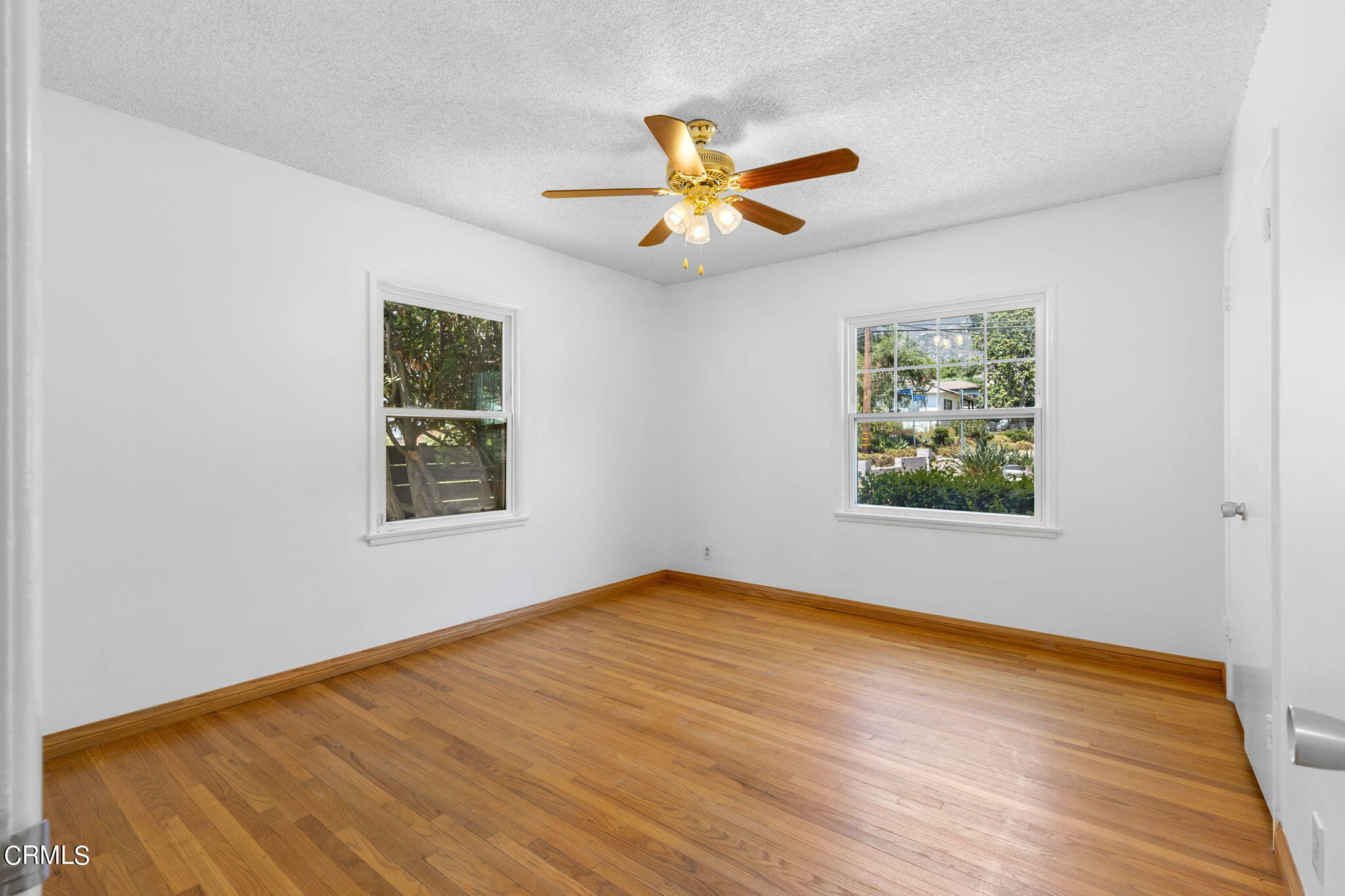 50 Marathon Road Altadena, CA 91001 - Photo 19 of 33 a view of an empty room with window and wooden floor