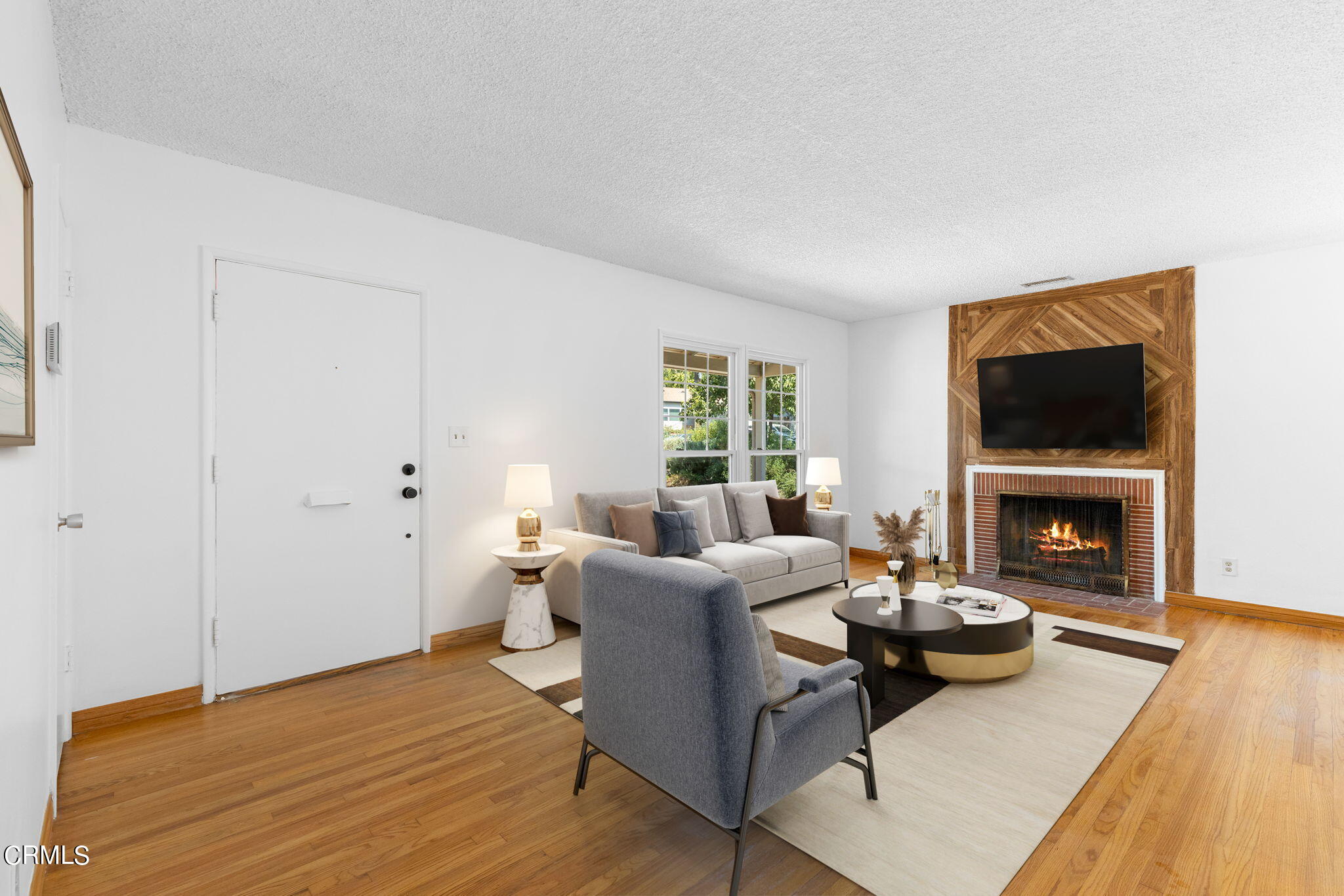 50 Marathon Road Altadena, CA 91001 - Photo 5 of 33 a living room with furniture and a fireplace
