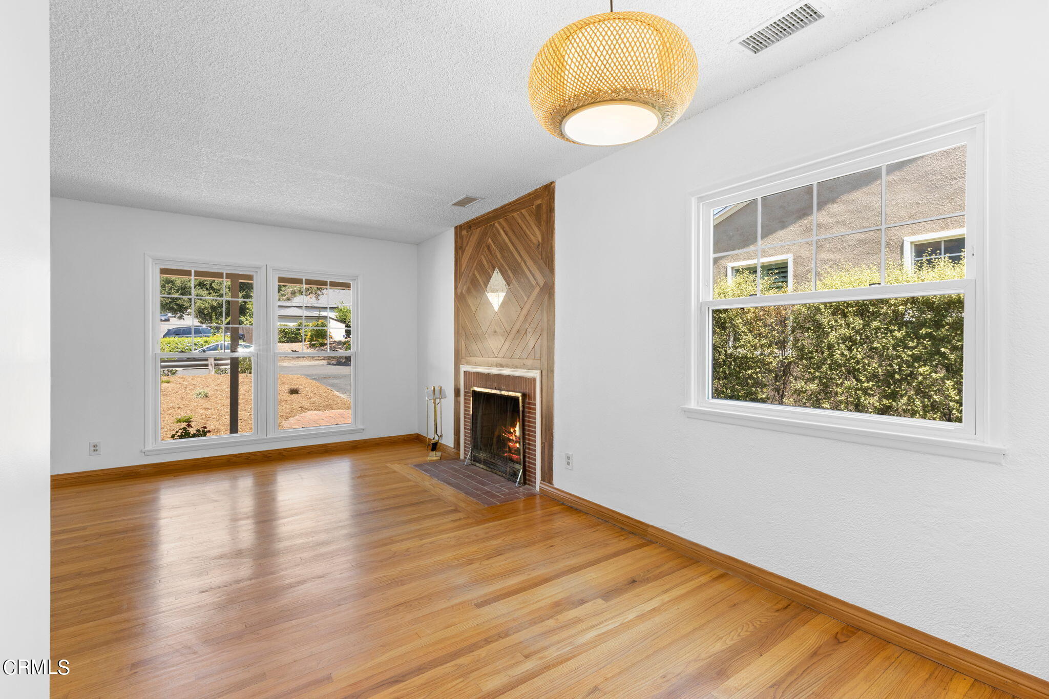 50 Marathon Road Altadena, CA 91001 - Photo 7 of 33 a view of an empty room with a window and wooden floor