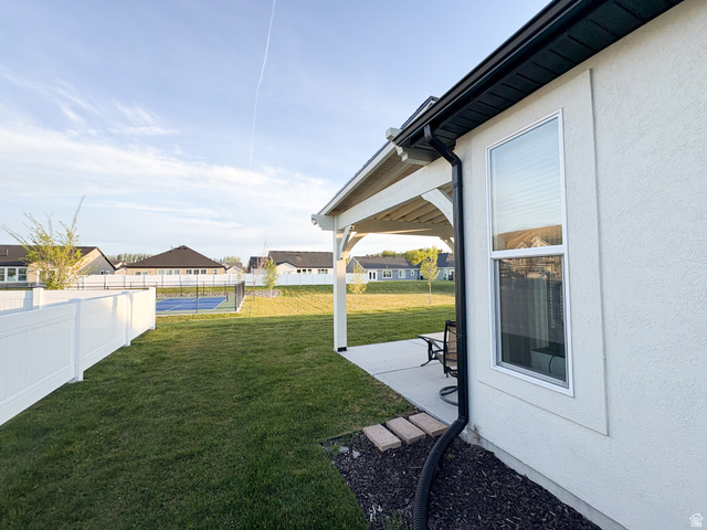 412 West 3025th Street South Logan, UT 84321 - Photo 11 of 34 Fenced yard with a residential view