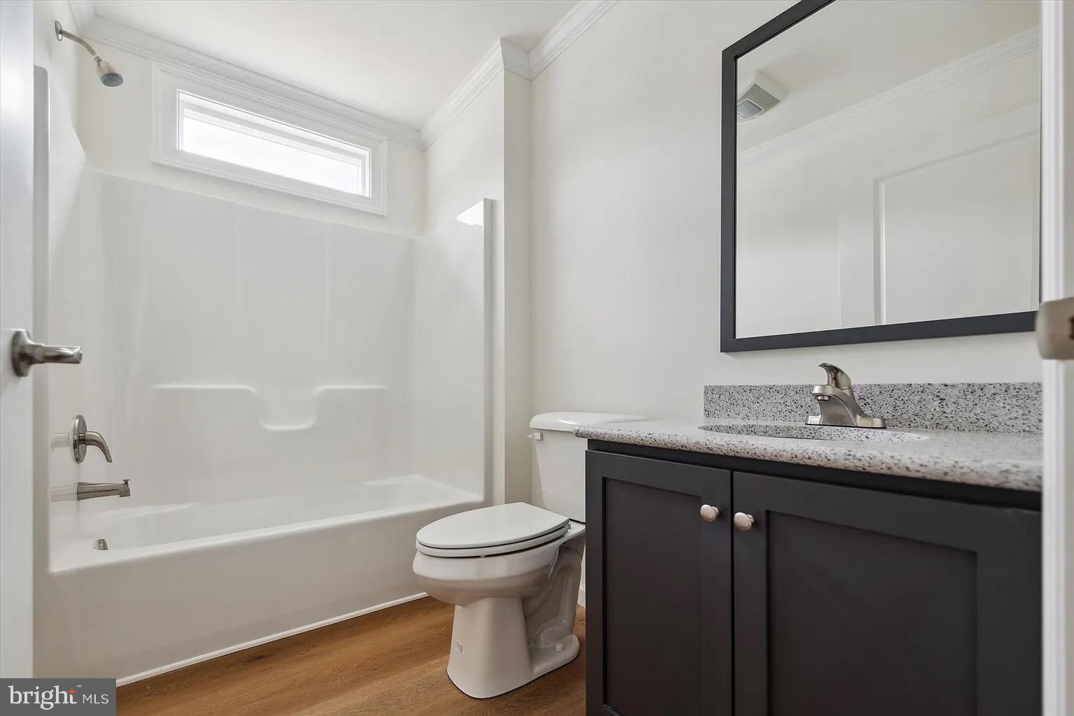 2 Ginger Lane Conowingo, MD 21918 - Photo 25 of 27 a bathroom with a granite countertop sink toilet and shower