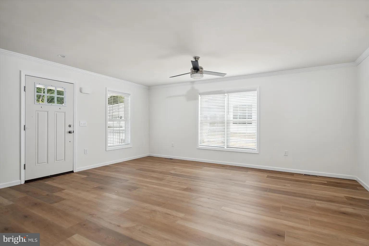 2 Ginger Lane Conowingo, MD 21918 - Photo 5 of 27 a view of an empty room with wooden floor and a window
