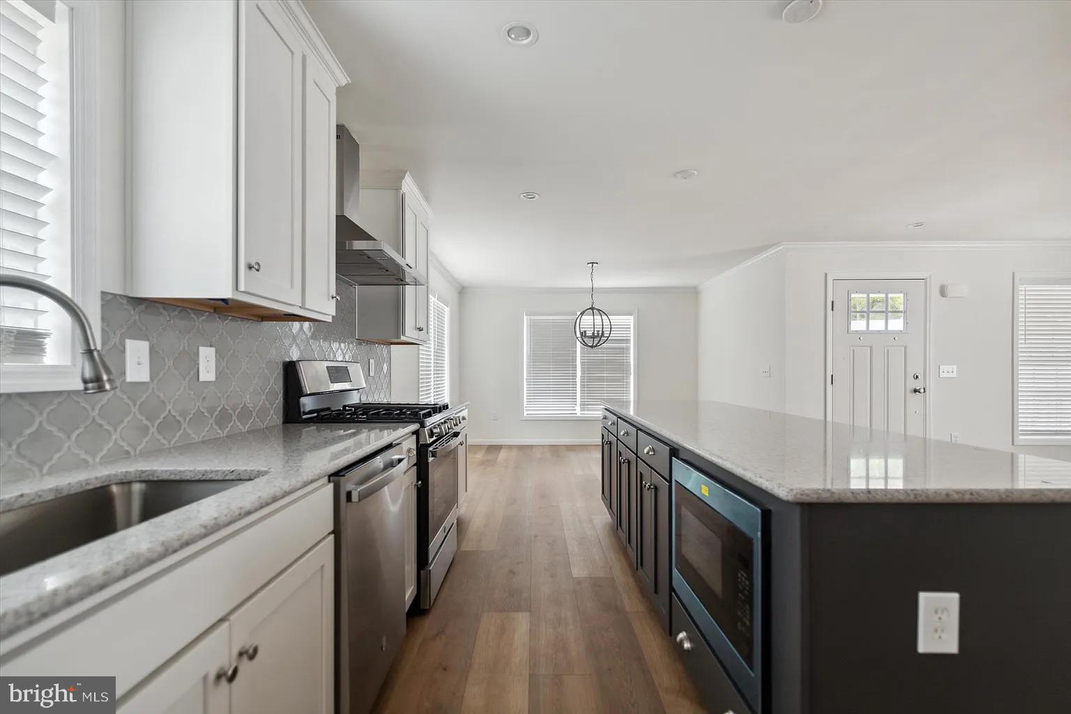 2 Ginger Lane Conowingo, MD 21918 - Photo 10 of 27 a kitchen with granite countertop a sink stove and cabinets
