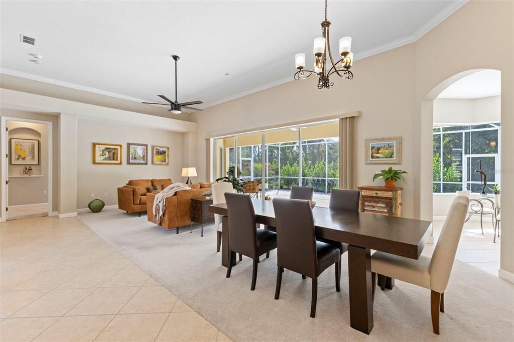 6840 Coyote Ridge Court Bradenton, FL 34201 - Photo 2 of 39 a view of a dining room with furniture window and outside view