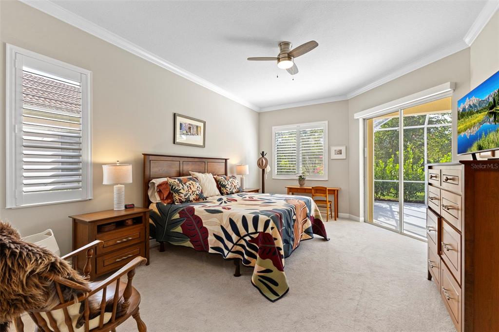 6840 Coyote Ridge Court Bradenton, FL 34201 - Photo 8 of 39 a bed room with furniture and a window