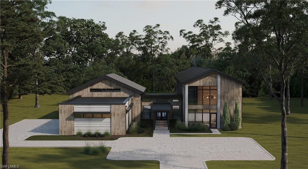 4161 3rd Avenue Southwest Naples, FL 34119 - Photo 11 of 13 a front view of a house with garden