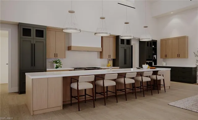 a kitchen with a table and chairs in it