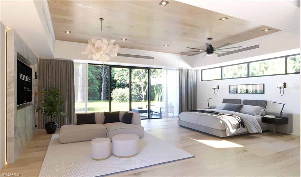 4161 3rd Avenue Southwest Naples, FL 34119 - Photo 5 of 9 a spacious bedroom with a bed and a large window