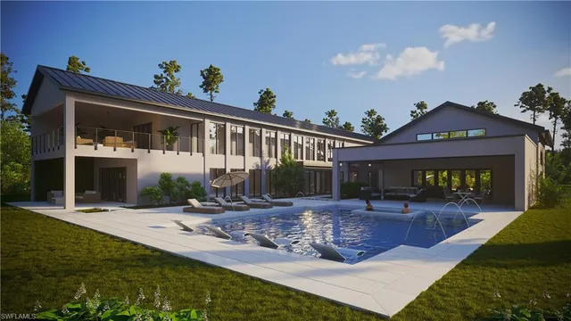 a view of a house with backyard porch and sitting area