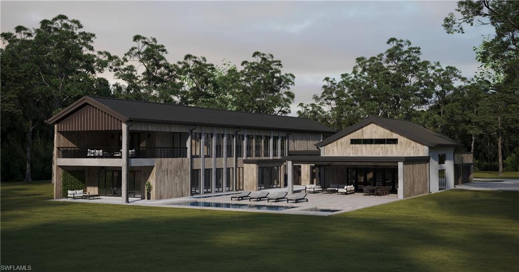 4161 3rd Avenue Southwest Naples, FL 34119 - Photo 9 of 13 a front view of house with yard outdoor seating and green space