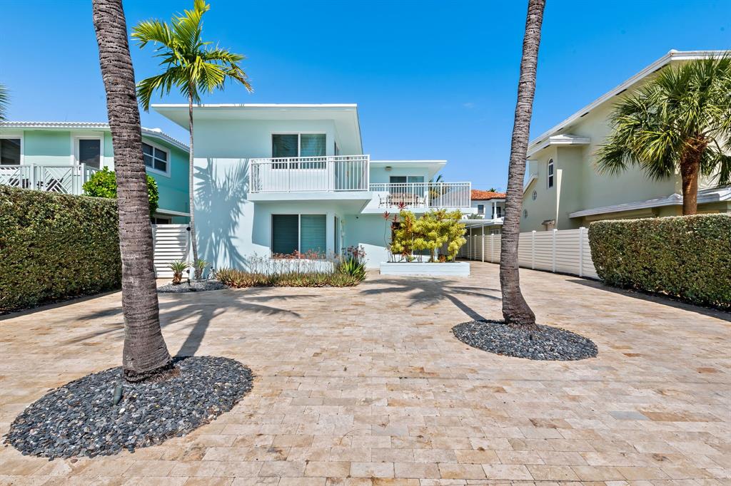 3321 Northeast 16th Court Fort Lauderdale, FL 33305 - Photo 14 of 41 a front view of a house with a yard