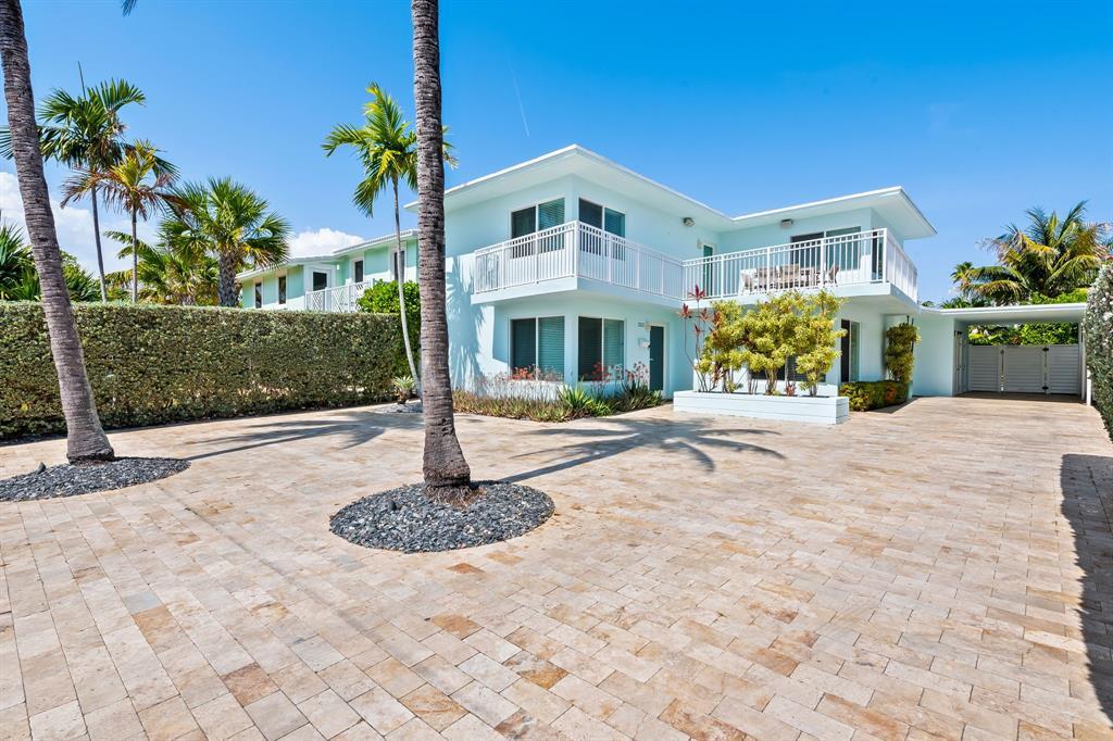 3321 Northeast 16th Court Fort Lauderdale, FL 33305 - Photo 24 of 41 a front view of a house with garden