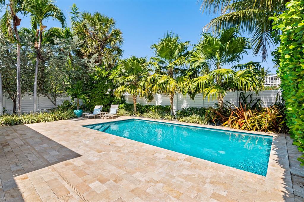 3321 Northeast 16th Court Fort Lauderdale, FL 33305 - Photo 25 of 41 a view of a swimming pool with a yard