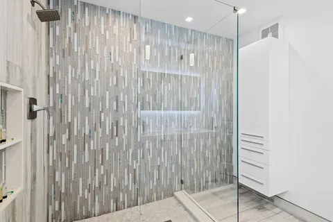 a view of a bathroom with shower