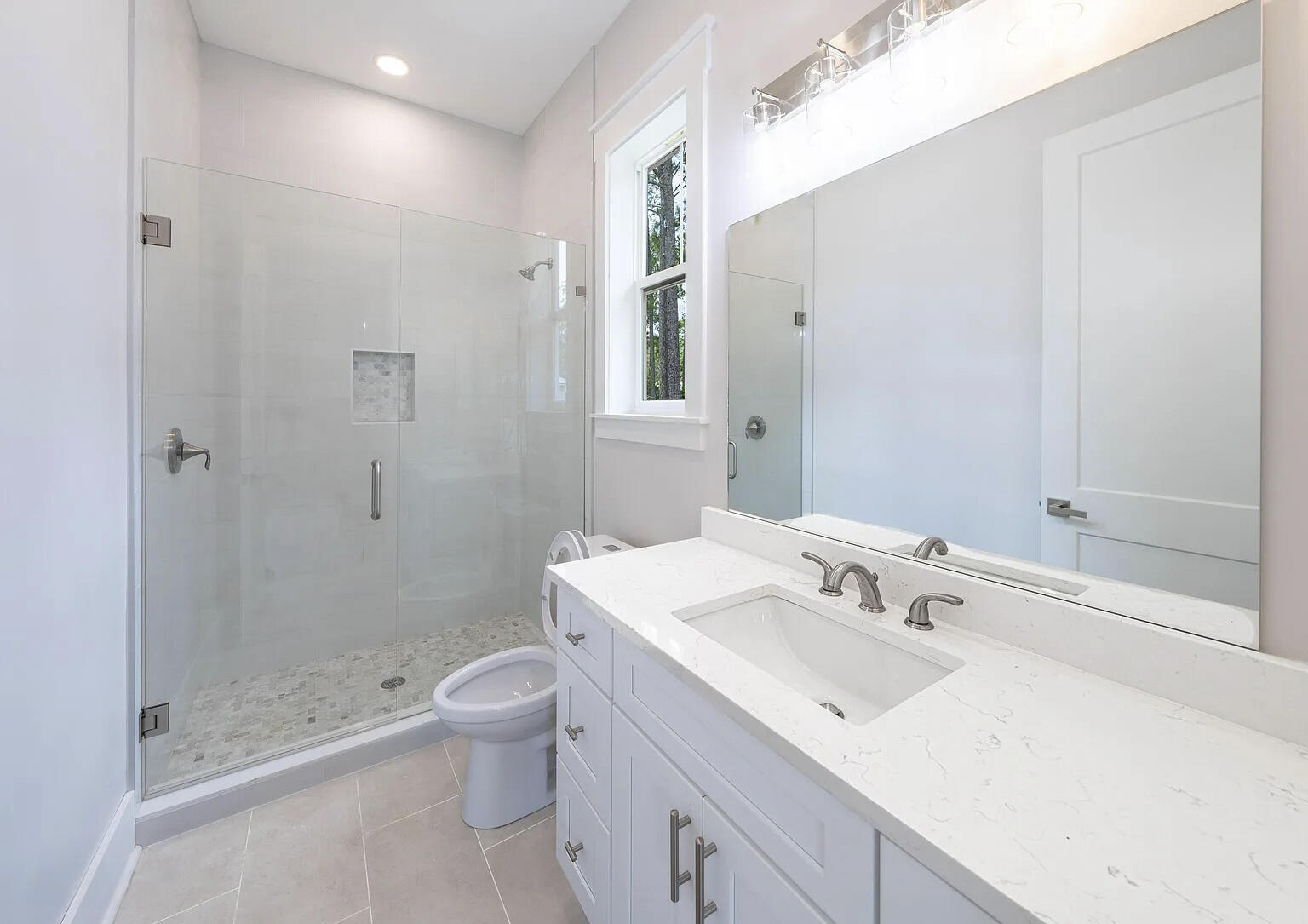 162 7th Street Santa Rosa Beach, FL 32459 - Photo 10 of 13 a bathroom with a sink a toilet and shower