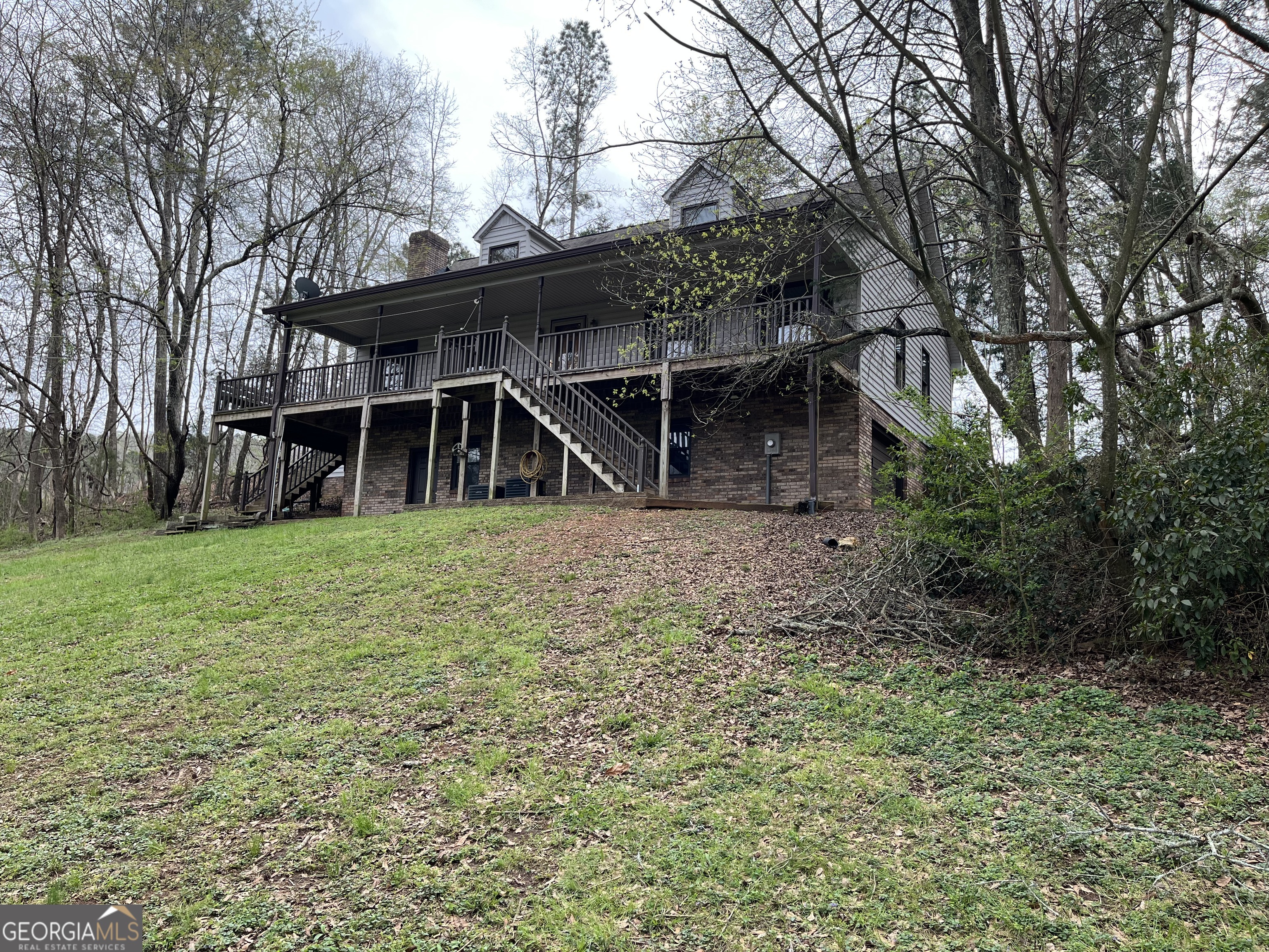 475 Davis Road Southwest Cave Spring, GA 30124 - Photo 1 of 27 a view of house with yard and seating area