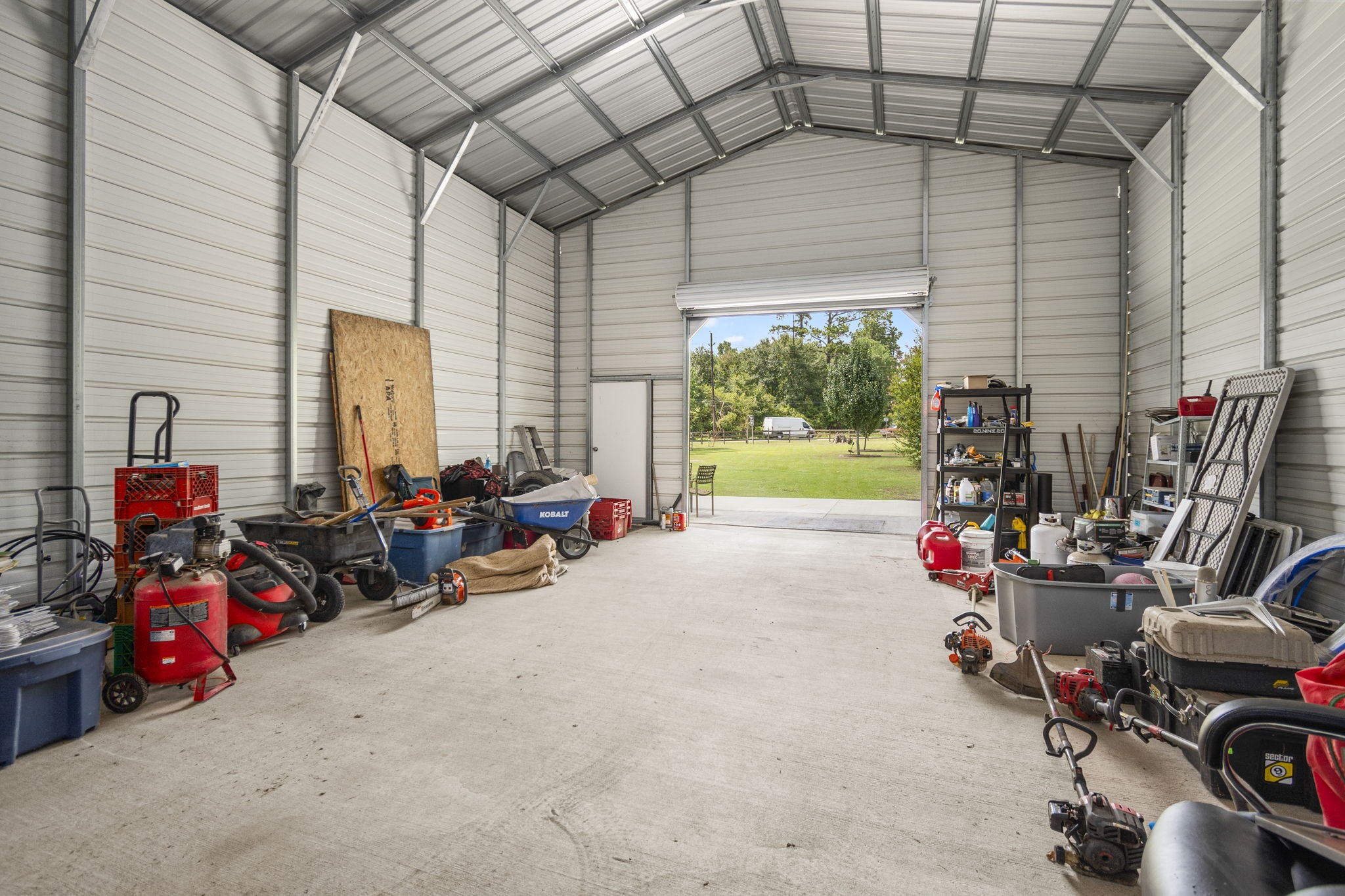 25311 Hardin Store Road Pinehurst, TX 77362 - Photo 28 of 39 a view of a room with gym equipment