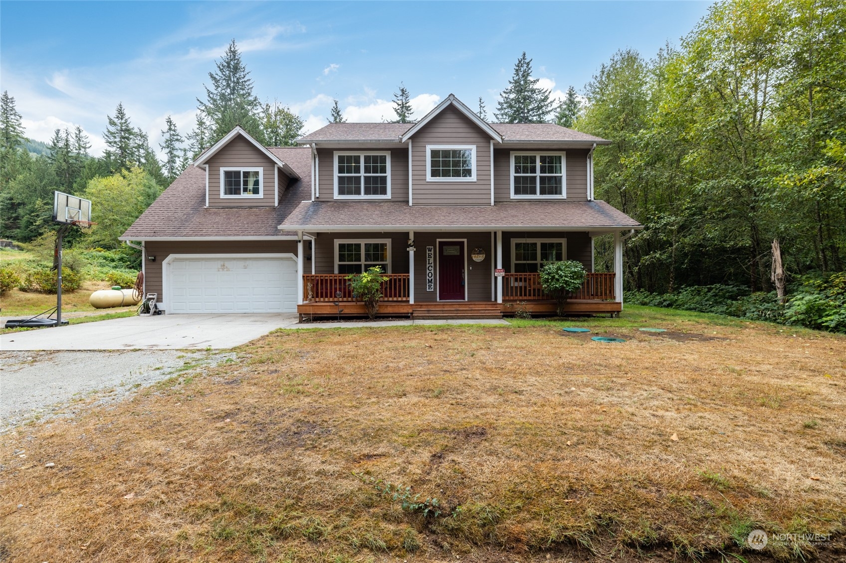 835 Alger Cain Lake Road Sedro-Woolley, WA 98284 - Photo 1 of 38 a front view of a house with yard
