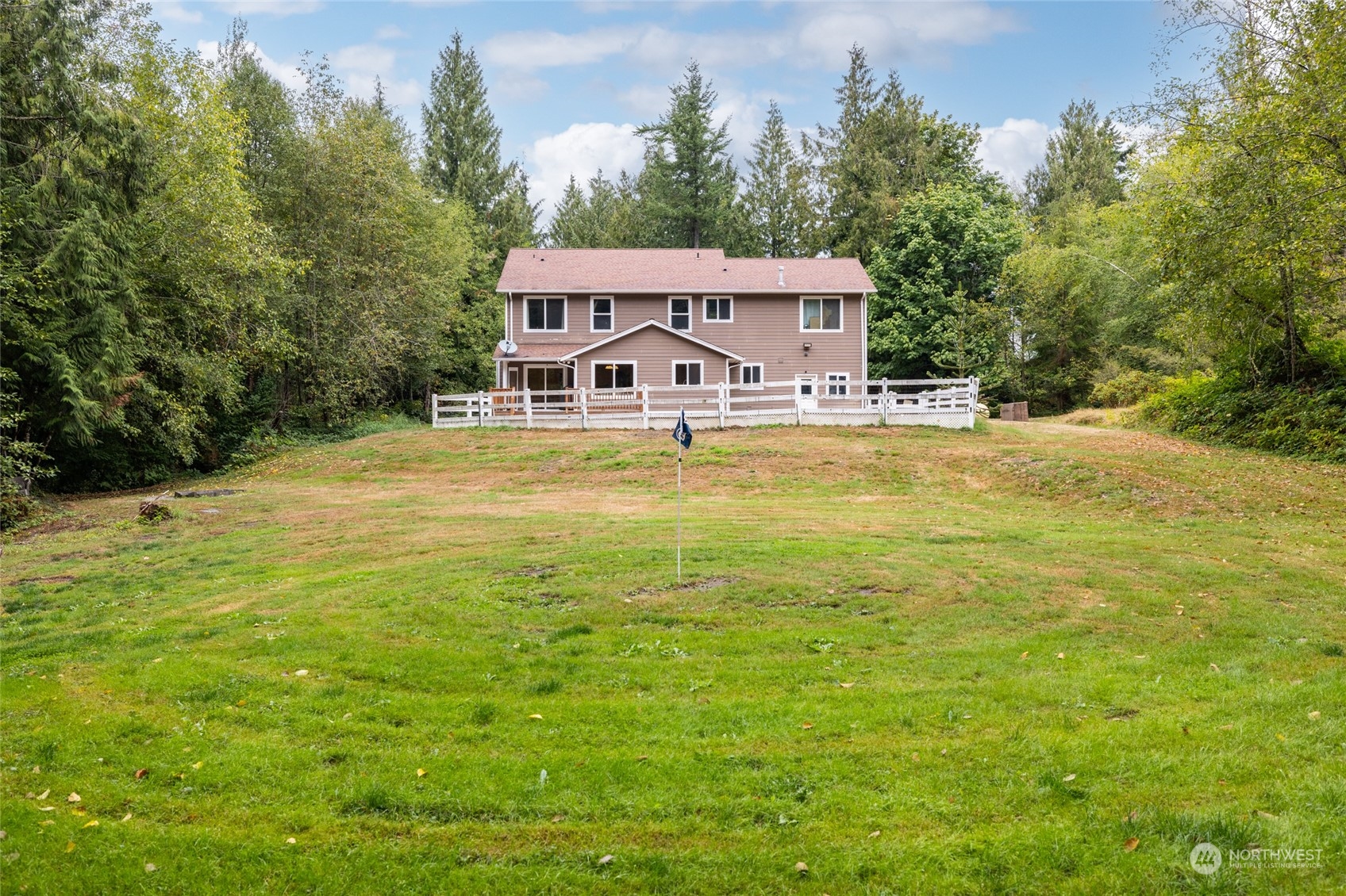 835 Alger Cain Lake Road Sedro-Woolley, WA 98284 - Photo 35 of 38 a front view of a house with a yard