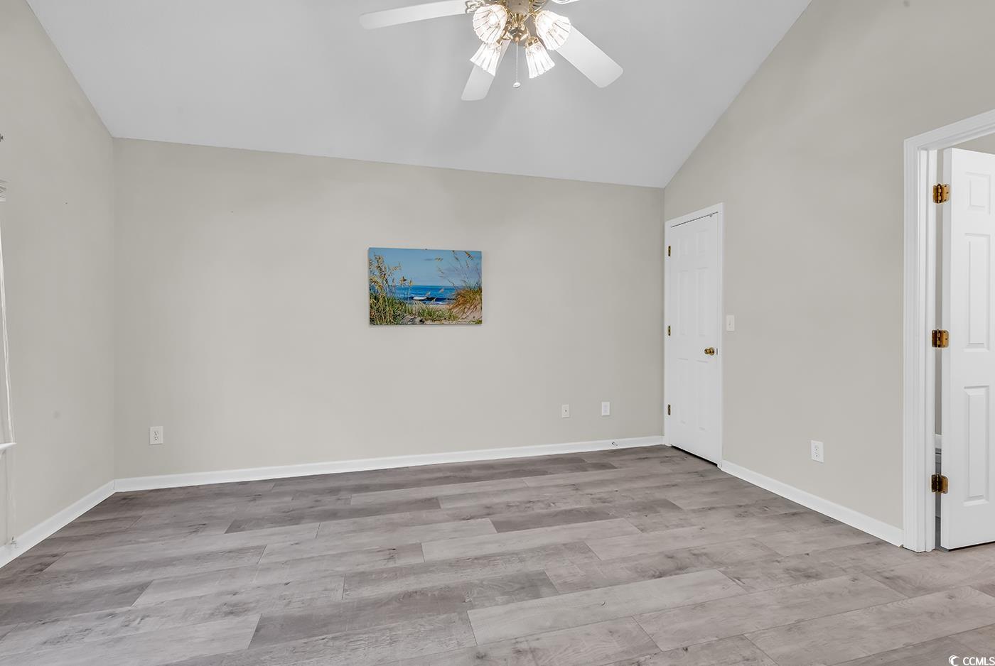 182 Wimbledon Way, Unit 182 Murrells Inlet, SC 29576 - Photo 15 of 37 Interior space with lofted ceiling, baseboards, wo