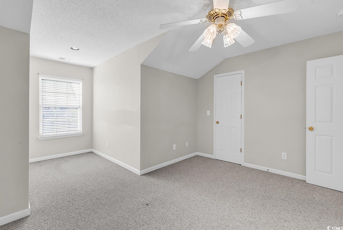 182 Wimbledon Way, Unit 182 Murrells Inlet, SC 29576 - Photo 19 of 37 Carpeted spare room with visible vents, baseboards