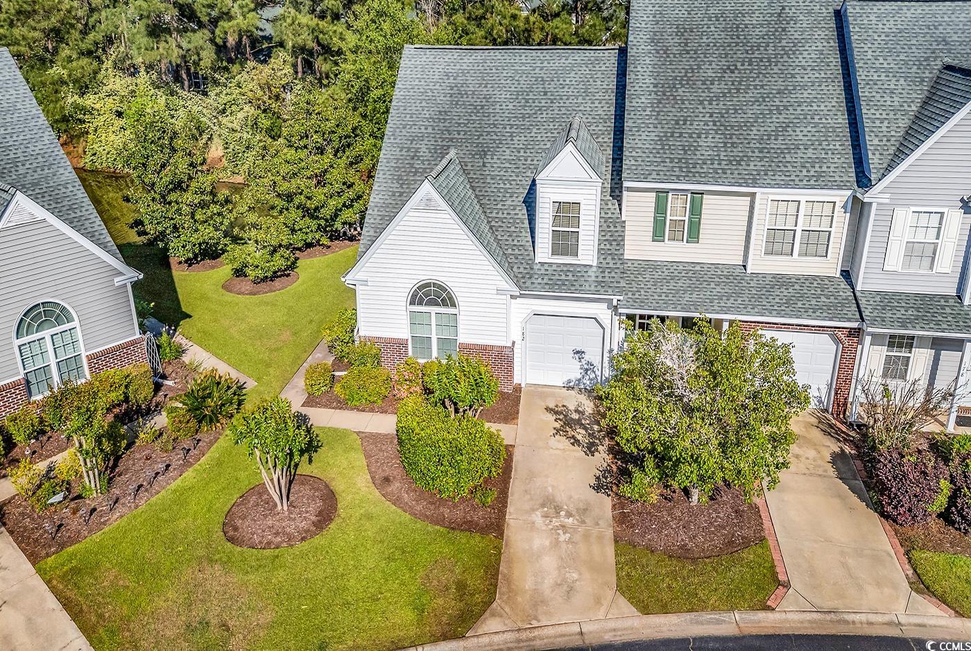182 Wimbledon Way, Unit 182 Murrells Inlet, SC 29576 - Photo 2 of 37 View of front of house featuring driveway, a shing