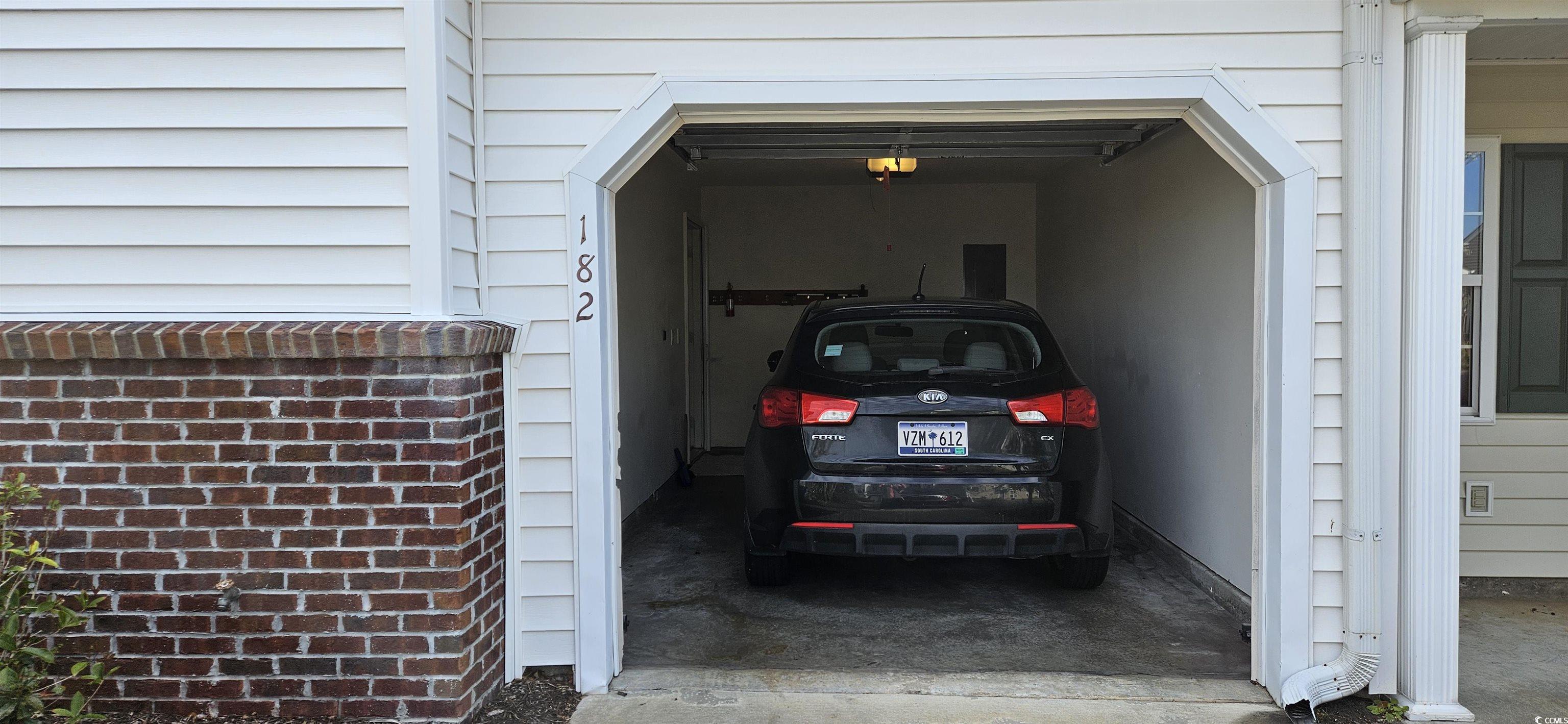 182 Wimbledon Way, Unit 182 Murrells Inlet, SC 29576 - Photo 27 of 37 View of garage