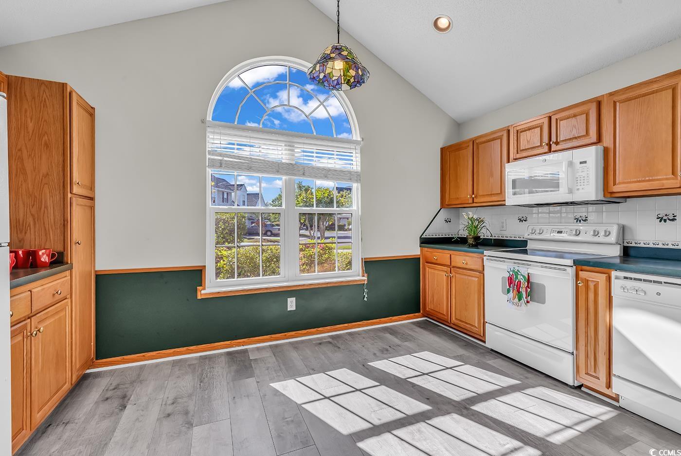 182 Wimbledon Way, Unit 182 Murrells Inlet, SC 29576 - Photo 9 of 37 Kitchen featuring a wealth of natural light, dark
