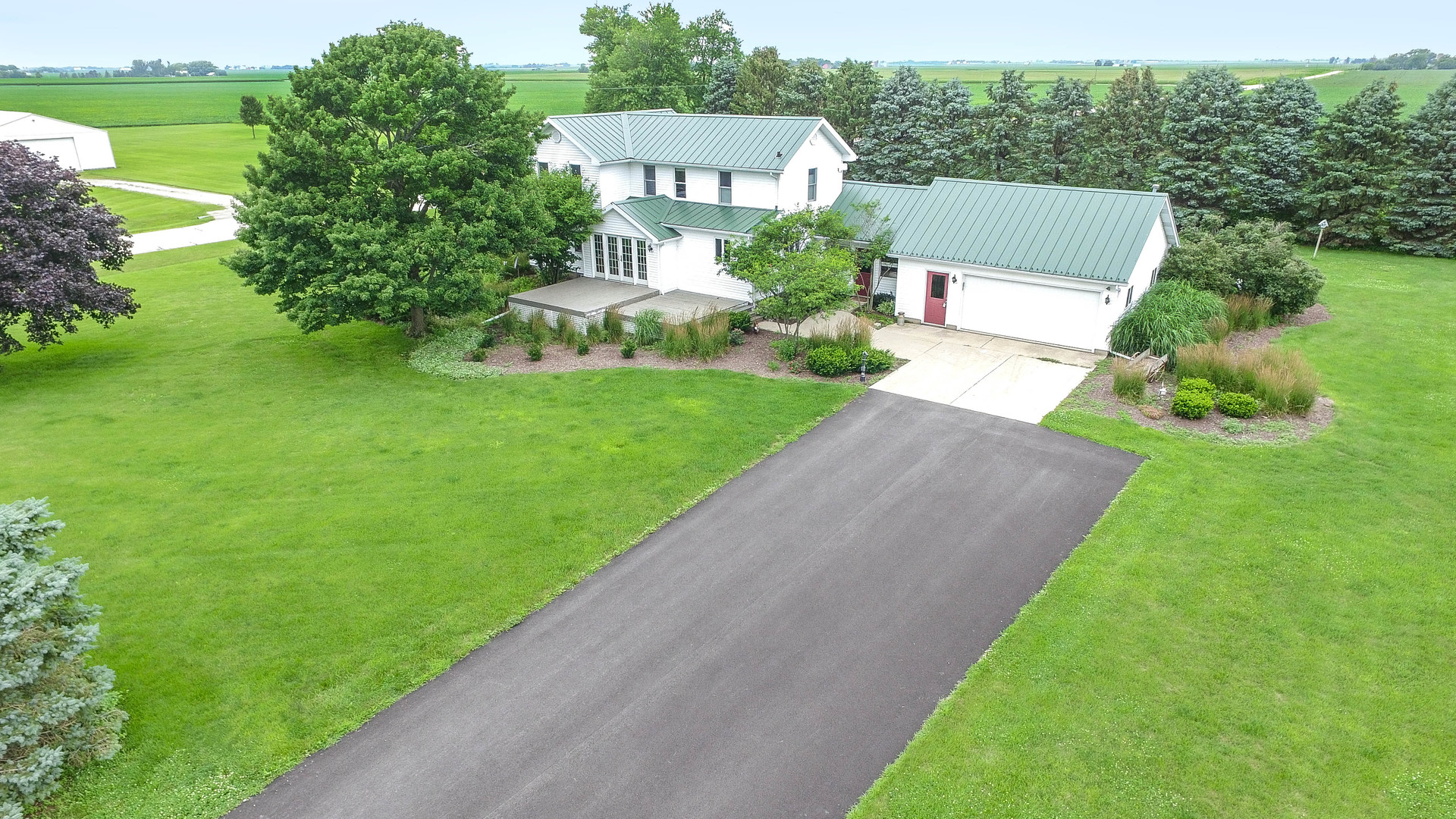 10732 Rimsnider Road Hinckley, IL 60520 - Photo 1 of 44 a view of a house with a yard