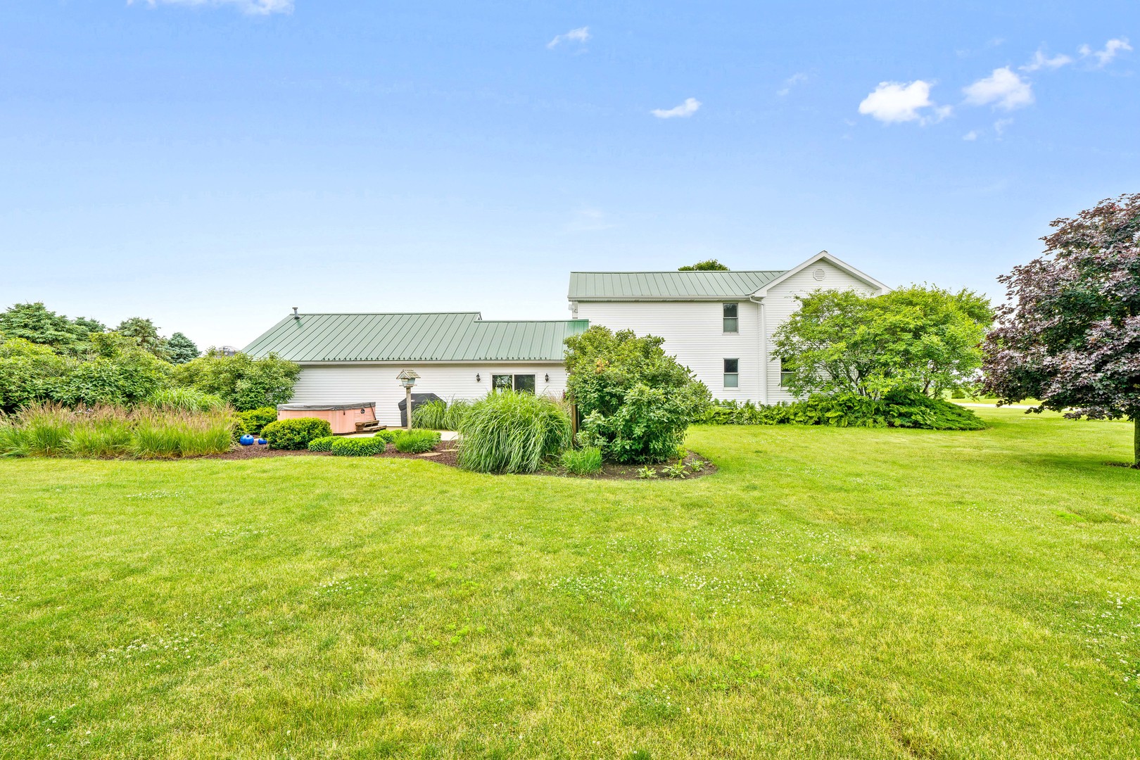 10732 Rimsnider Road Hinckley, IL 60520 - Photo 11 of 44 a view of a big yard with a house