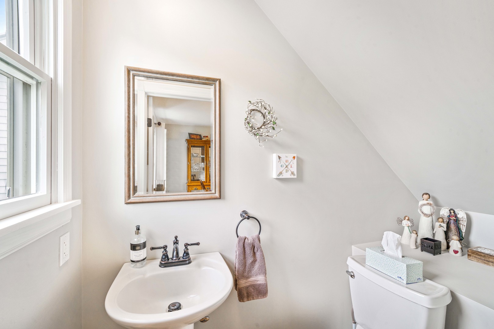10732 Rimsnider Road Hinckley, IL 60520 - Photo 22 of 44 a bathroom with a sink and a mirror