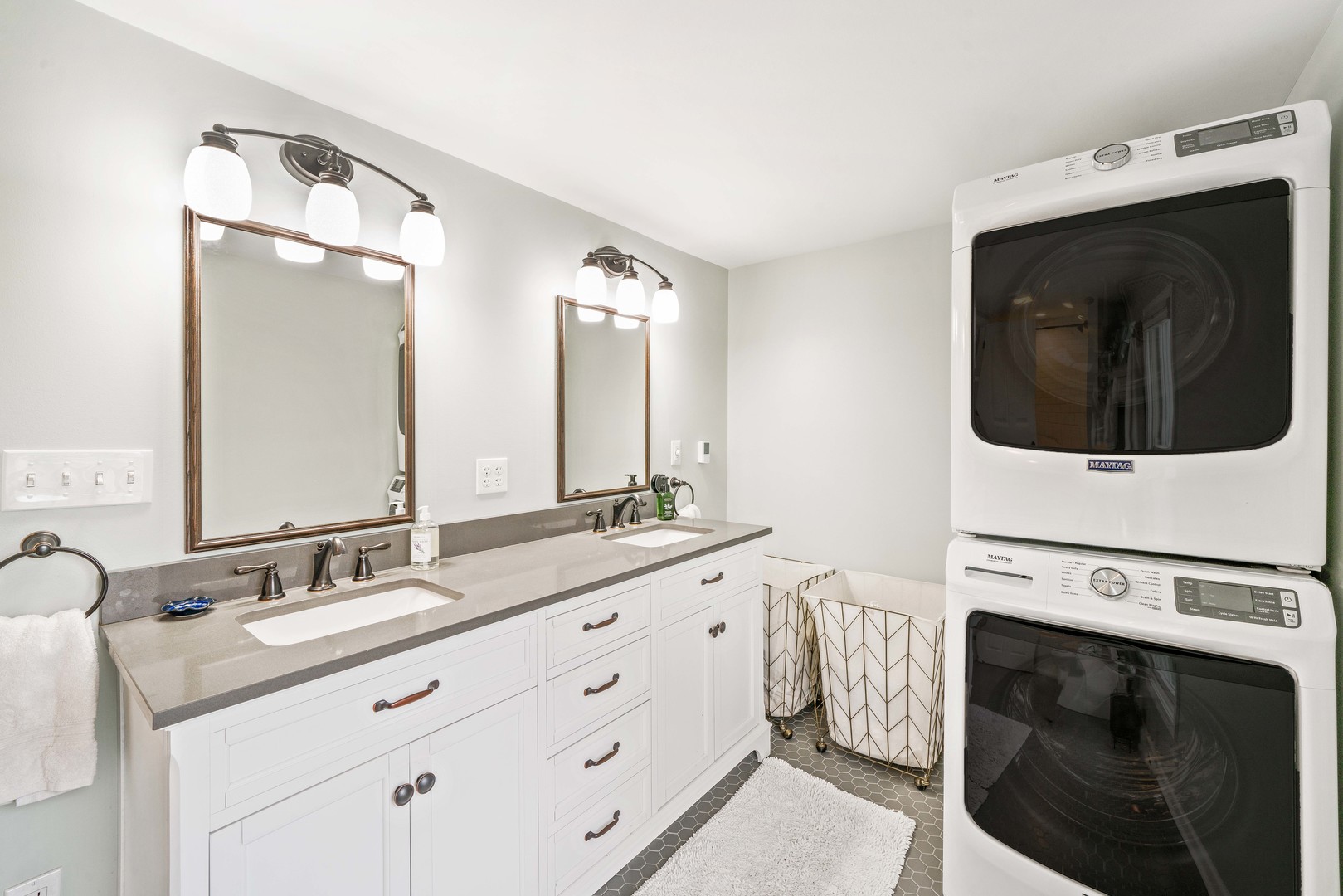 10732 Rimsnider Road Hinckley, IL 60520 - Photo 26 of 44 a bathroom with a double vanity sink and mirror