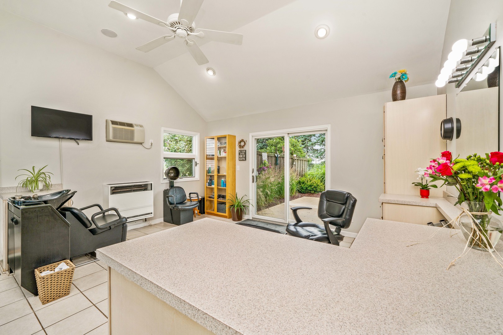 10732 Rimsnider Road Hinckley, IL 60520 - Photo 28 of 44 a room with furniture and a flat screen tv