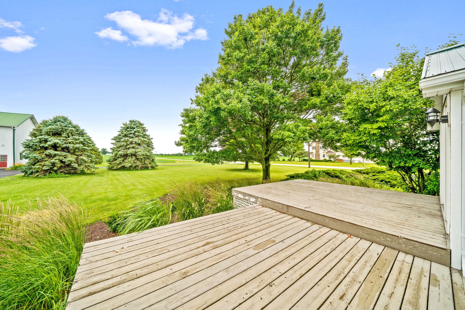 10732 Rimsnider Road Hinckley, IL 60520 - Photo 32 of 44 a view of a patio with a yard
