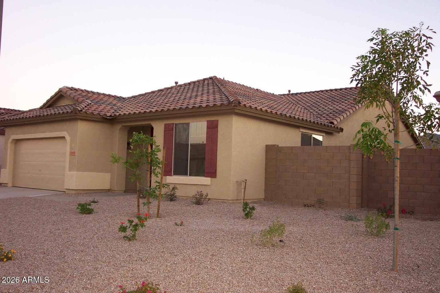 3095 East Merlot Street Gilbert, AZ 85298 - Photo 2 of 13 a house view with a backyard space