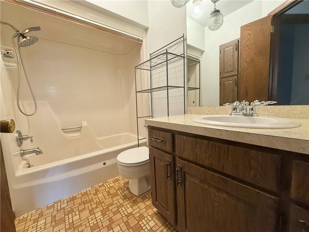 841 East Lutton Street New Castle, PA 16101 - Photo 11 of 12 a bathroom with a sink a toilet and shower