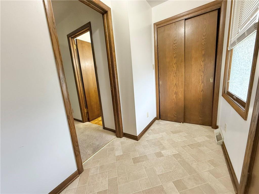 841 East Lutton Street New Castle, PA 16101 - Photo 2 of 12 a view of a closet in a mirror