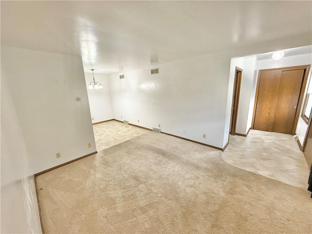 841 East Lutton Street New Castle, PA 16101 - Photo 4 of 12 an empty room with windows